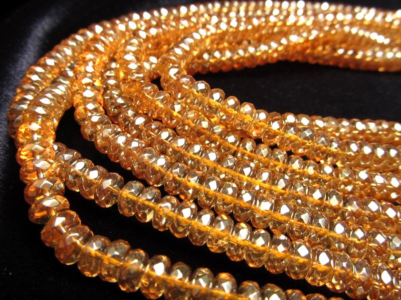 ☆オーラキラキラカット☆6mm☆一連☆ゴールデンオーラボタンカット(蒸着水晶)☆ロンデル【ブラジル産】