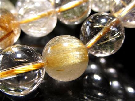 ゴールドルチルクォーツ 針入り水晶 ルチレイテッドクォーツ ビーズ連 連材